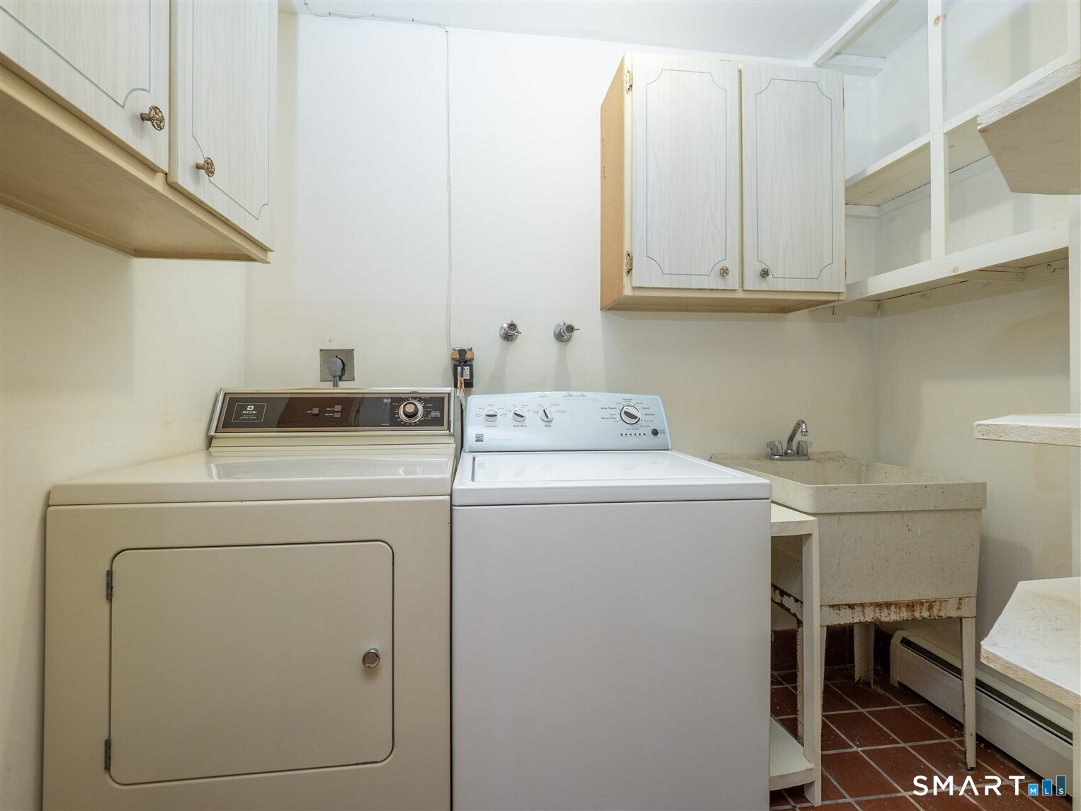 78 Ruscoe Road Wilton, CT 06897 - Photo 16 of 40 a utility room with dryer and washer