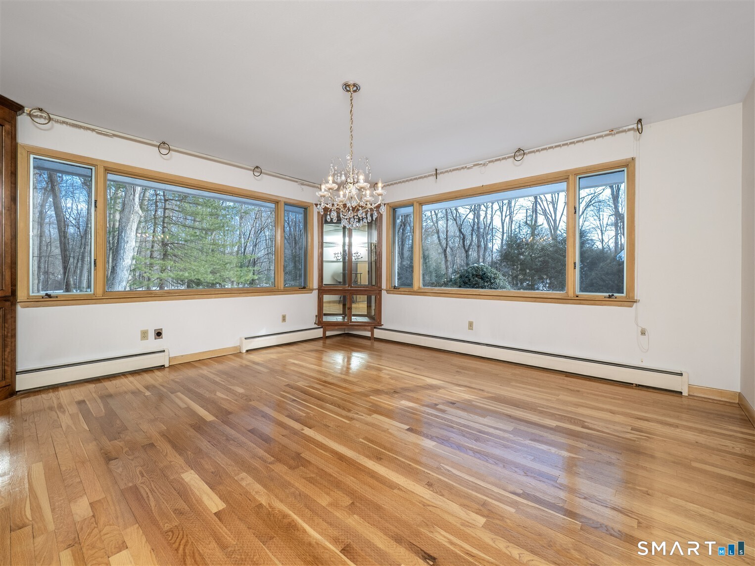 78 Ruscoe Road Wilton, CT 06897 - Photo 22 of 40 a view of a room with window wooden floor and windows