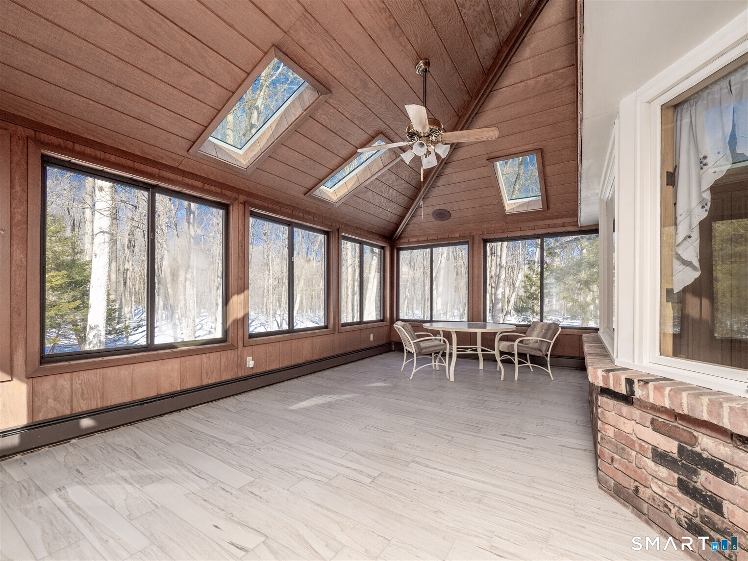 78 Ruscoe Road Wilton, CT 06897 - Photo 28 of 40 a view of a dining room with furniture window and outside view