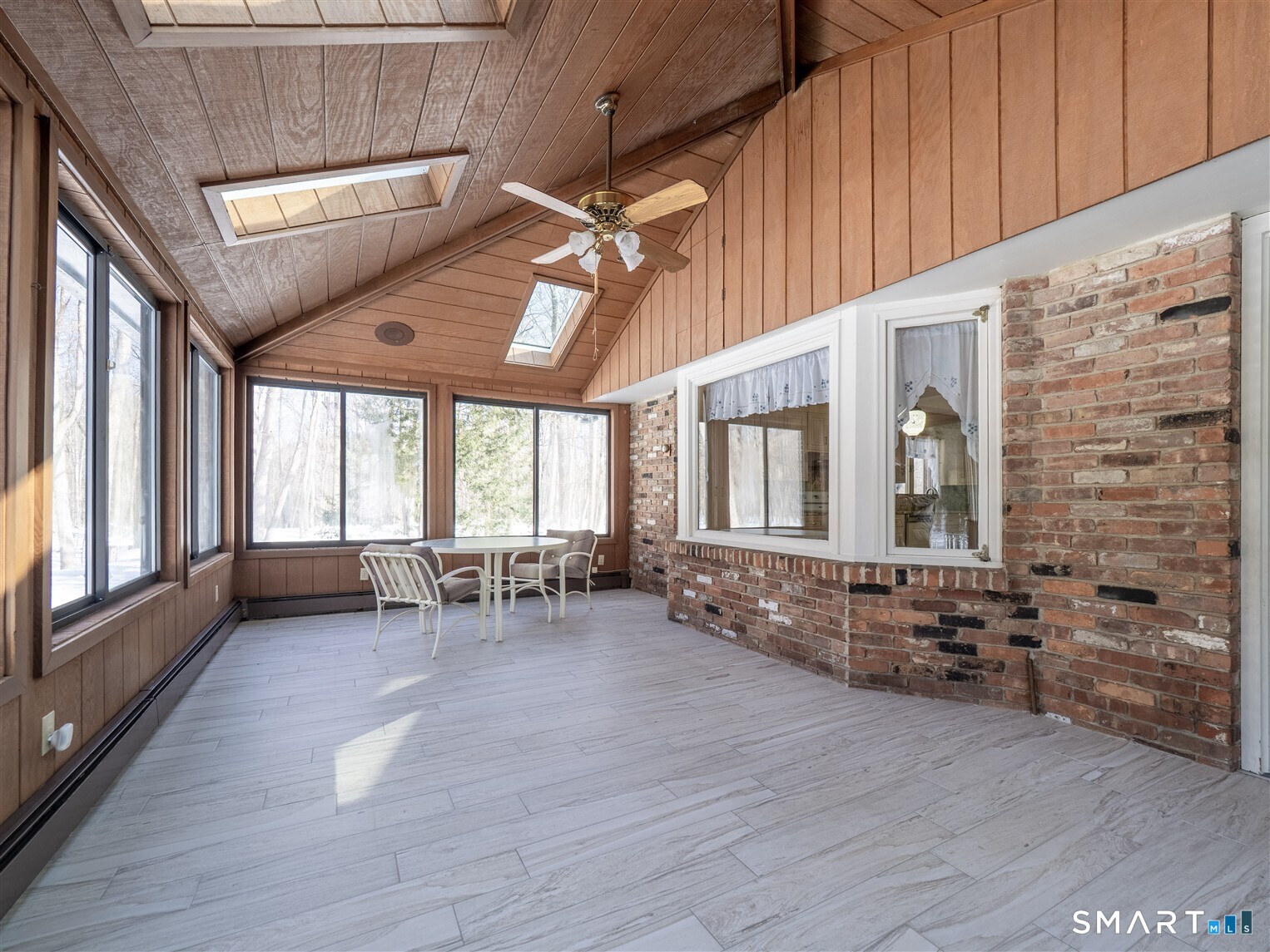 78 Ruscoe Road Wilton, CT 06897 - Photo 29 of 40 a view of livingroom with furniture window and outside view