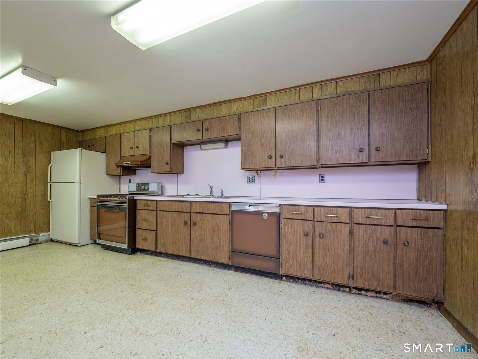 78 Ruscoe Road Wilton, CT 06897 - Photo 32 of 40 a kitchen with granite countertop cabinets a sink stainless steel appliances and cabinets
