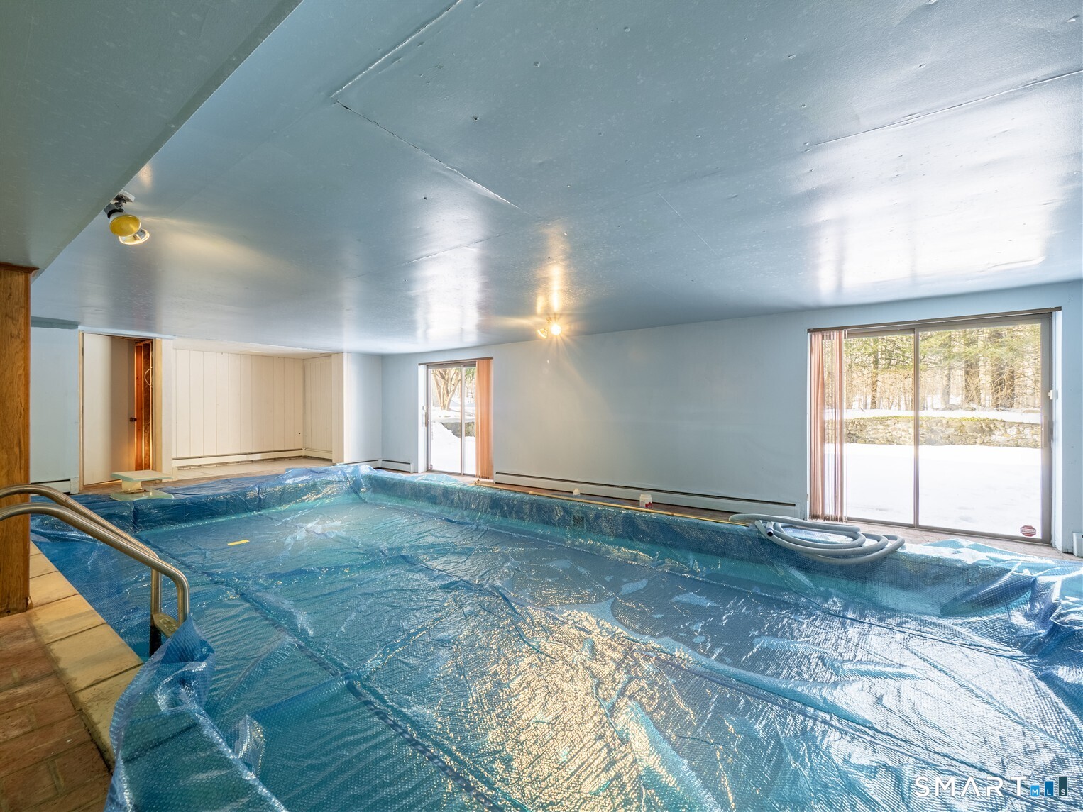 78 Ruscoe Road Wilton, CT 06897 - Photo 35 of 40 a view of a livingroom with a staircase