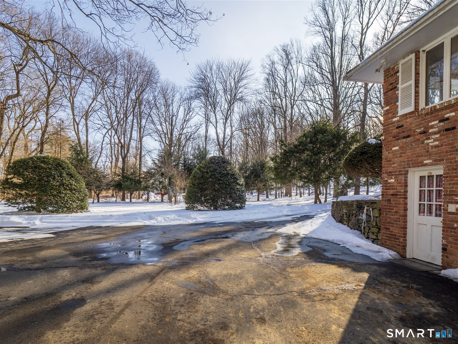 78 Ruscoe Road Wilton, CT 06897 - Photo 4 of 40 a view of a yard with trees