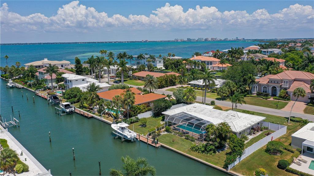 BOATING TO BEACH LIFESTYLE AWAITS YOU !! JUST 4 HOMES IN FROM THE BAY...