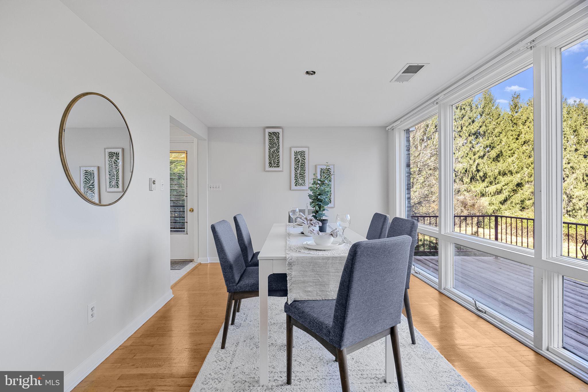 21315 Ridge Road Freeland, MD 21053 - Photo 13 of 69 a view of a dining room with furniture window and wooden floor