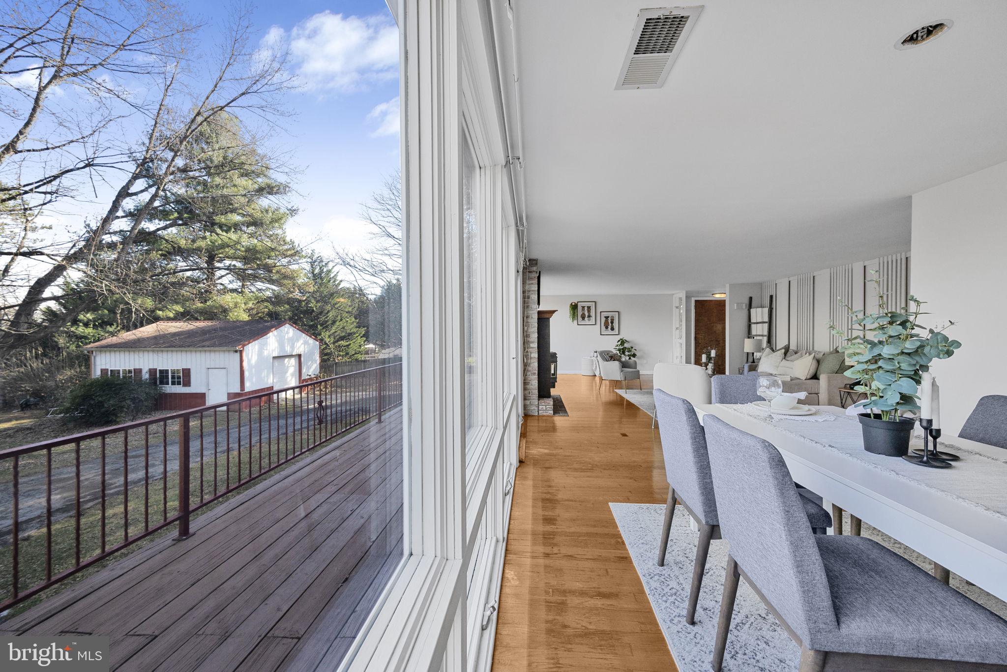 21315 Ridge Road Freeland, MD 21053 - Photo 17 of 69 a view of a balcony with wooden floor