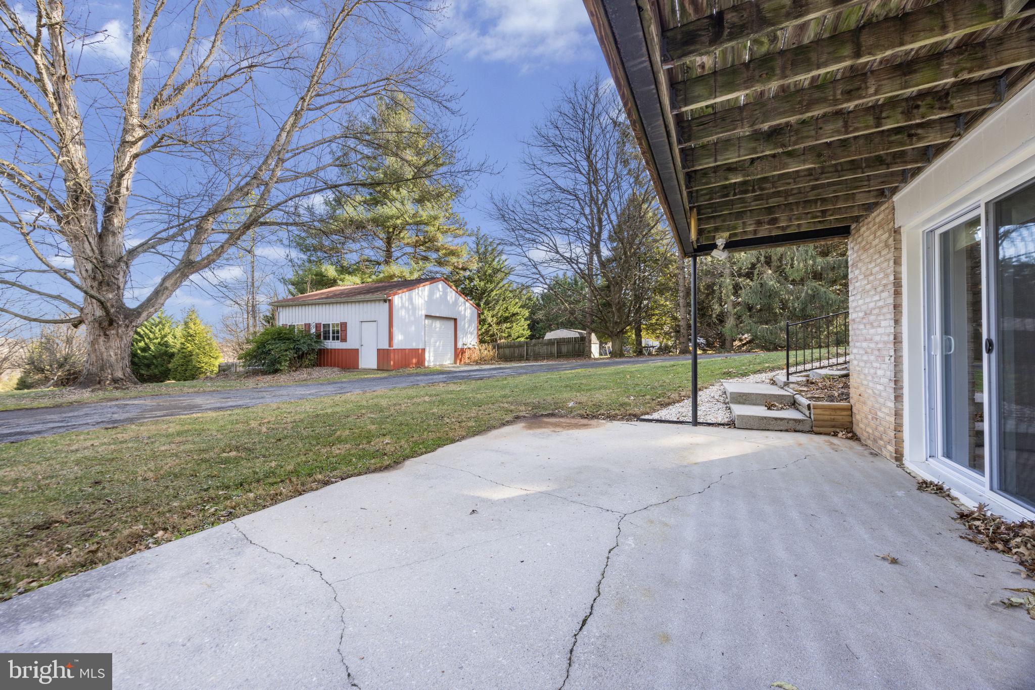 21315 Ridge Road Freeland, MD 21053 - Photo 51 of 69 a view of a house with backyard and tree