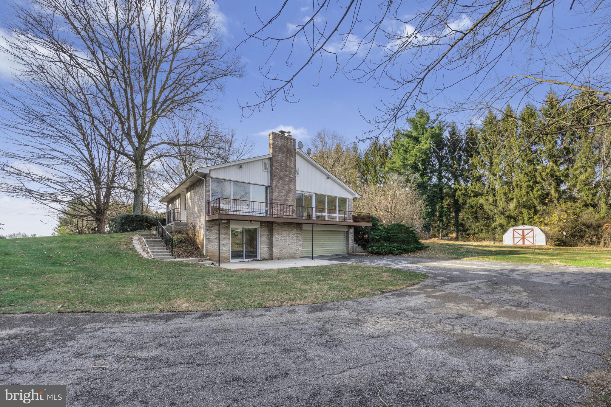 21315 Ridge Road Freeland, MD 21053 - Photo 55 of 69 a view of a house with a yard