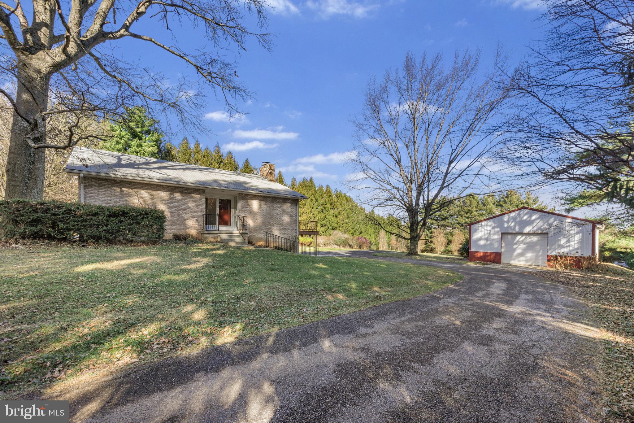 21315 Ridge Road Freeland, MD 21053 - Photo 7 of 69 a view of a house with a yard