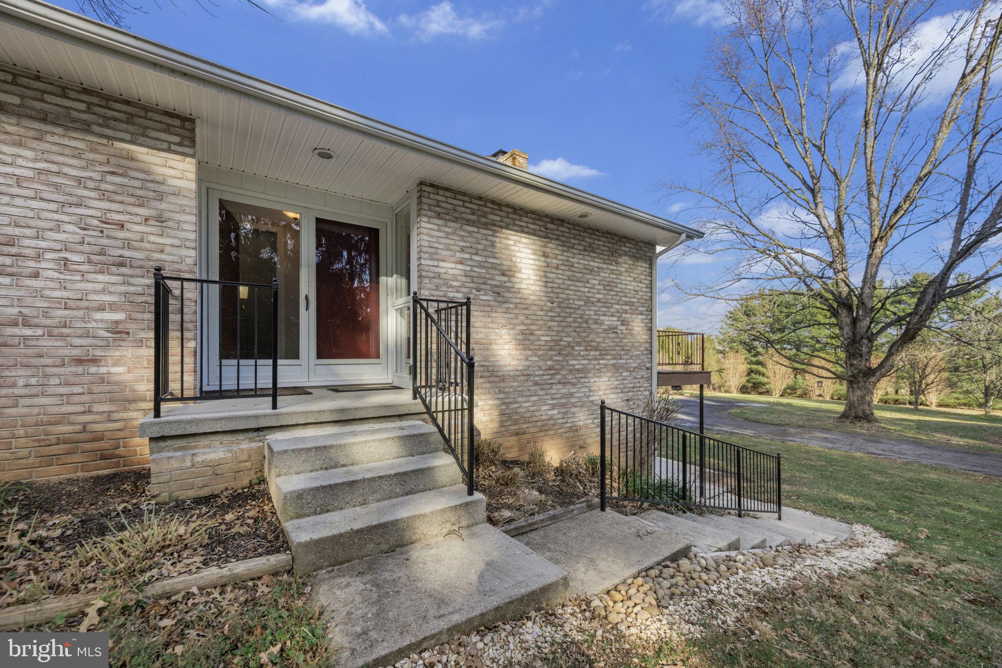21315 Ridge Road Freeland, MD 21053 - Photo 8 of 69 a front view of a house with a yard