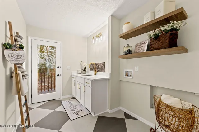 a view of room with cabinets