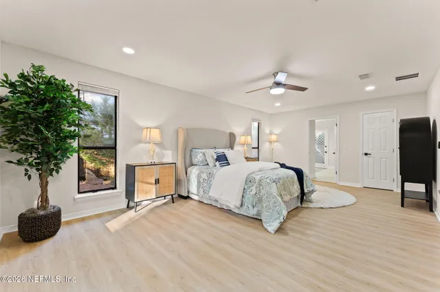 a bathroom with a shower curtain and a shower curtain