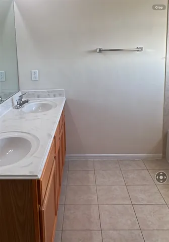 a bathroom with a sink a vanity and a mirror