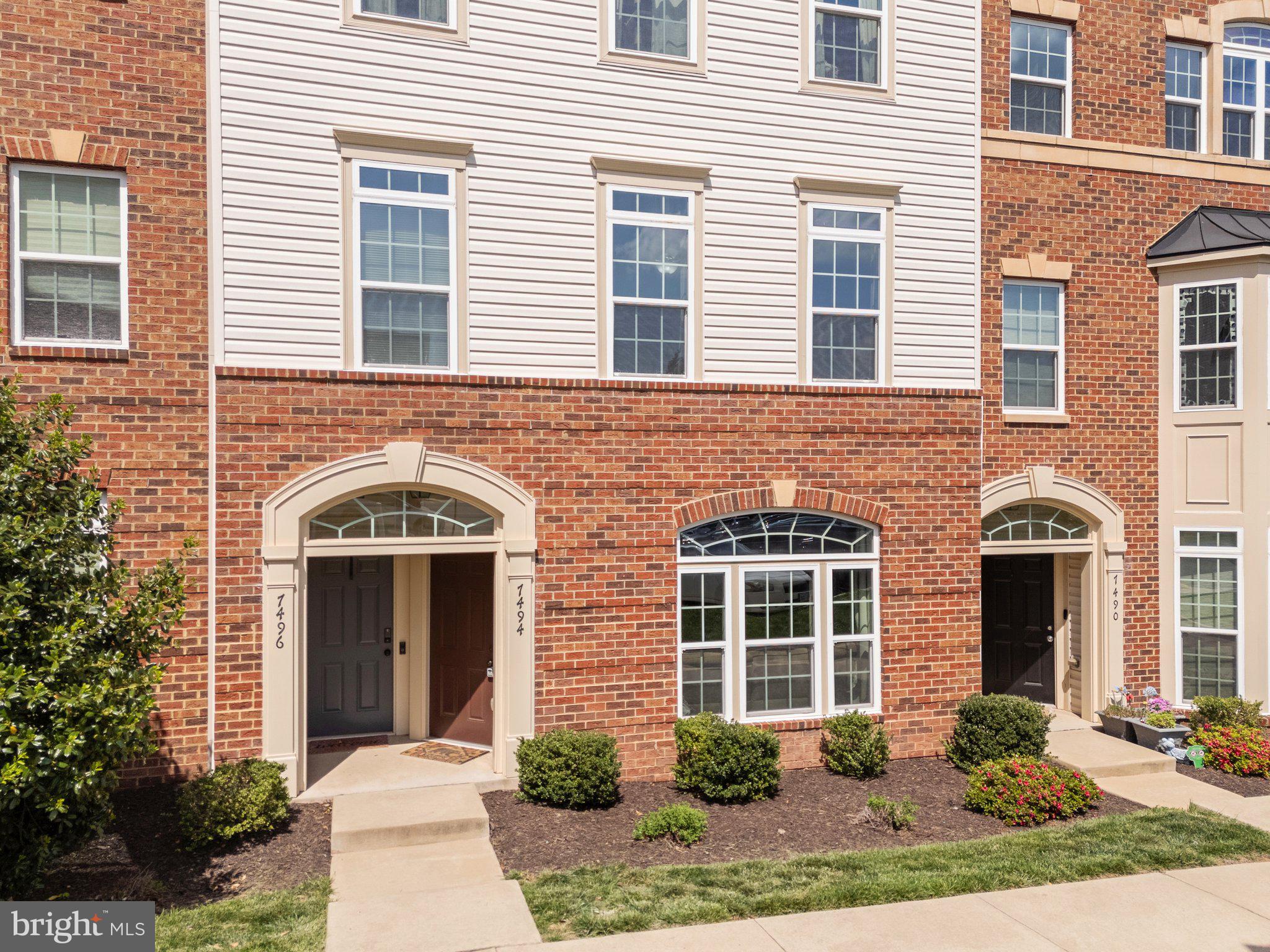 a front view of a brick house