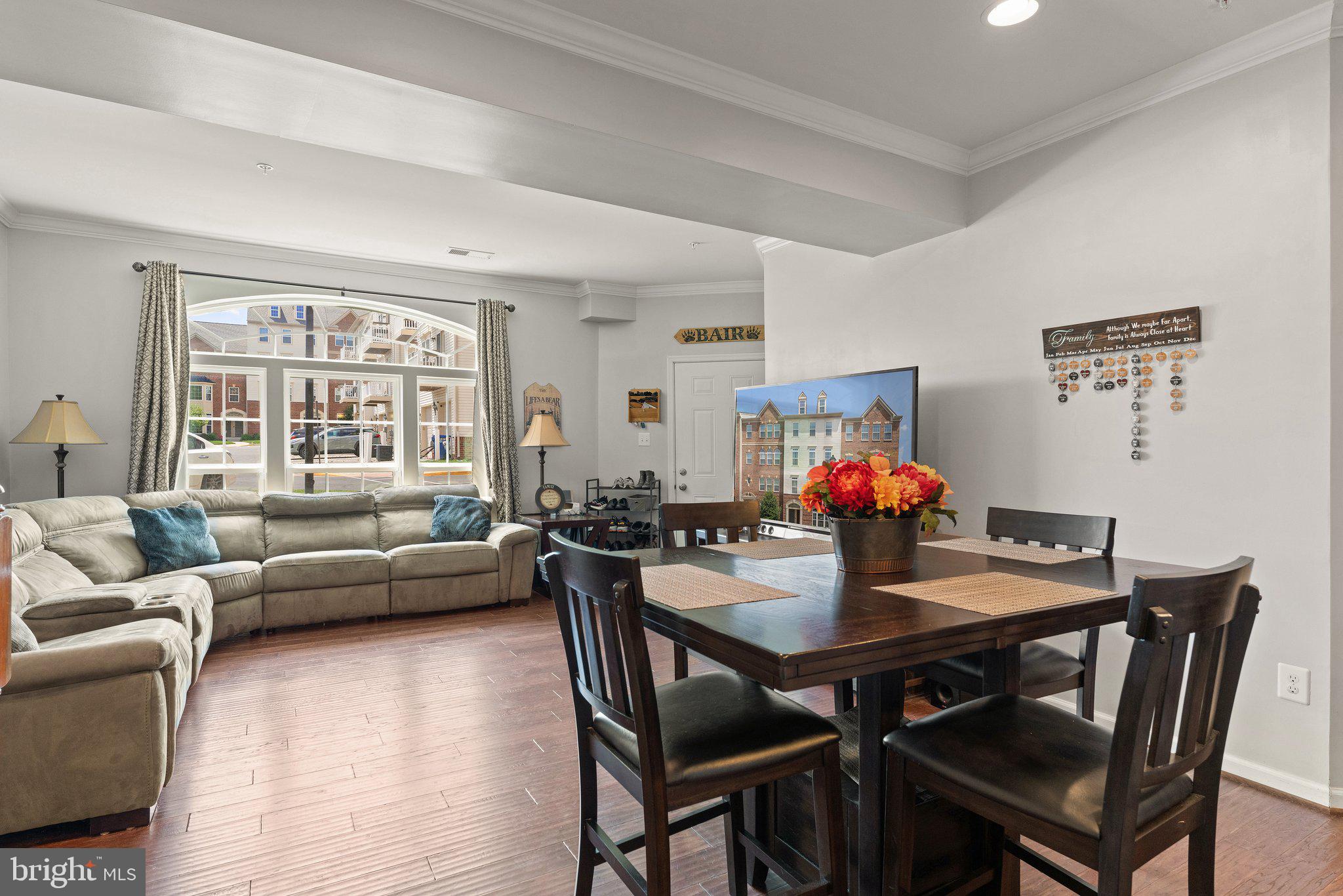 7494 Brunson Circle Gainesville, VA 20155 - Photo 18 of 49 a view of a dining room with furniture window and outside view