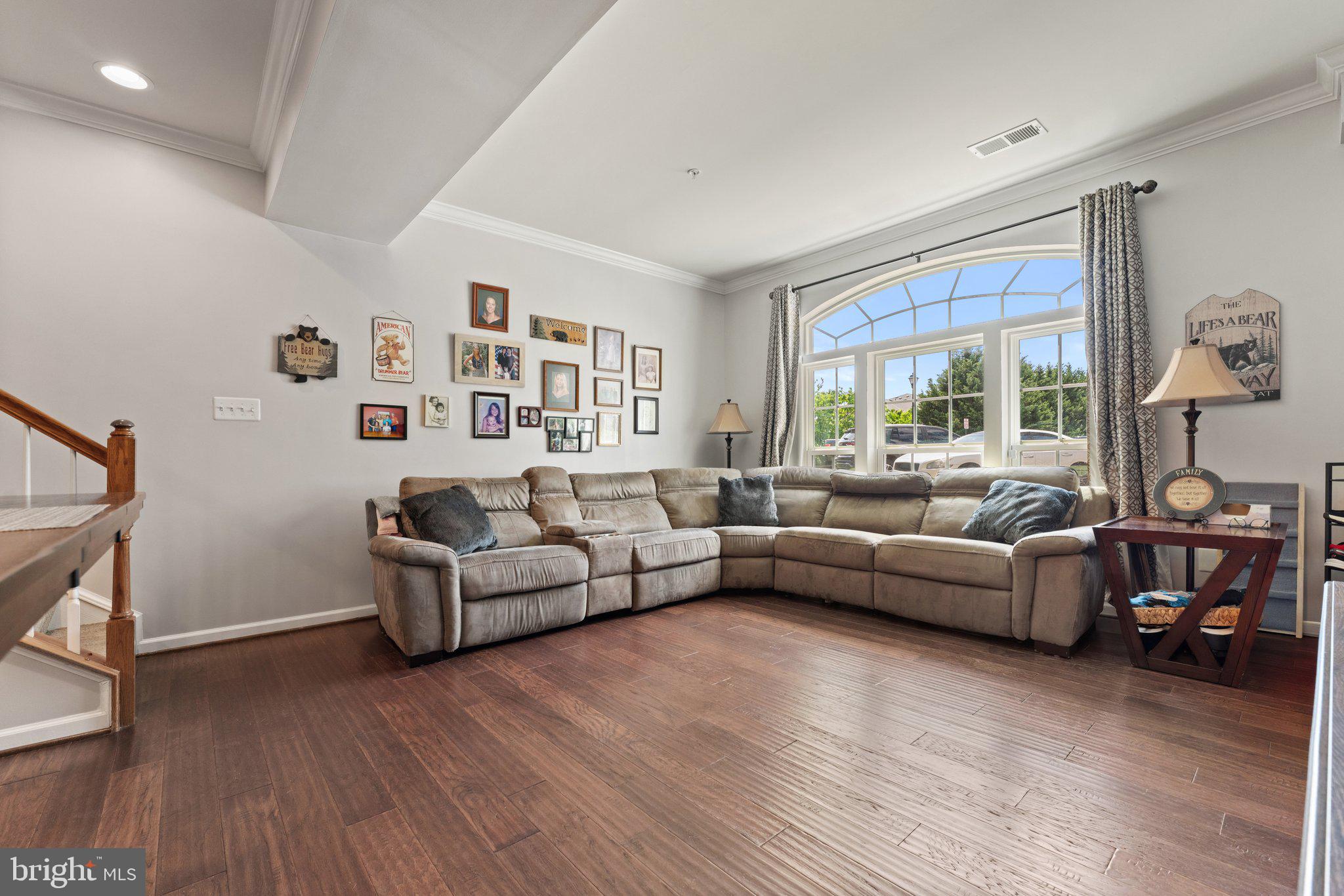 7494 Brunson Circle Gainesville, VA 20155 - Photo 20 of 49 a living room with furniture and a window