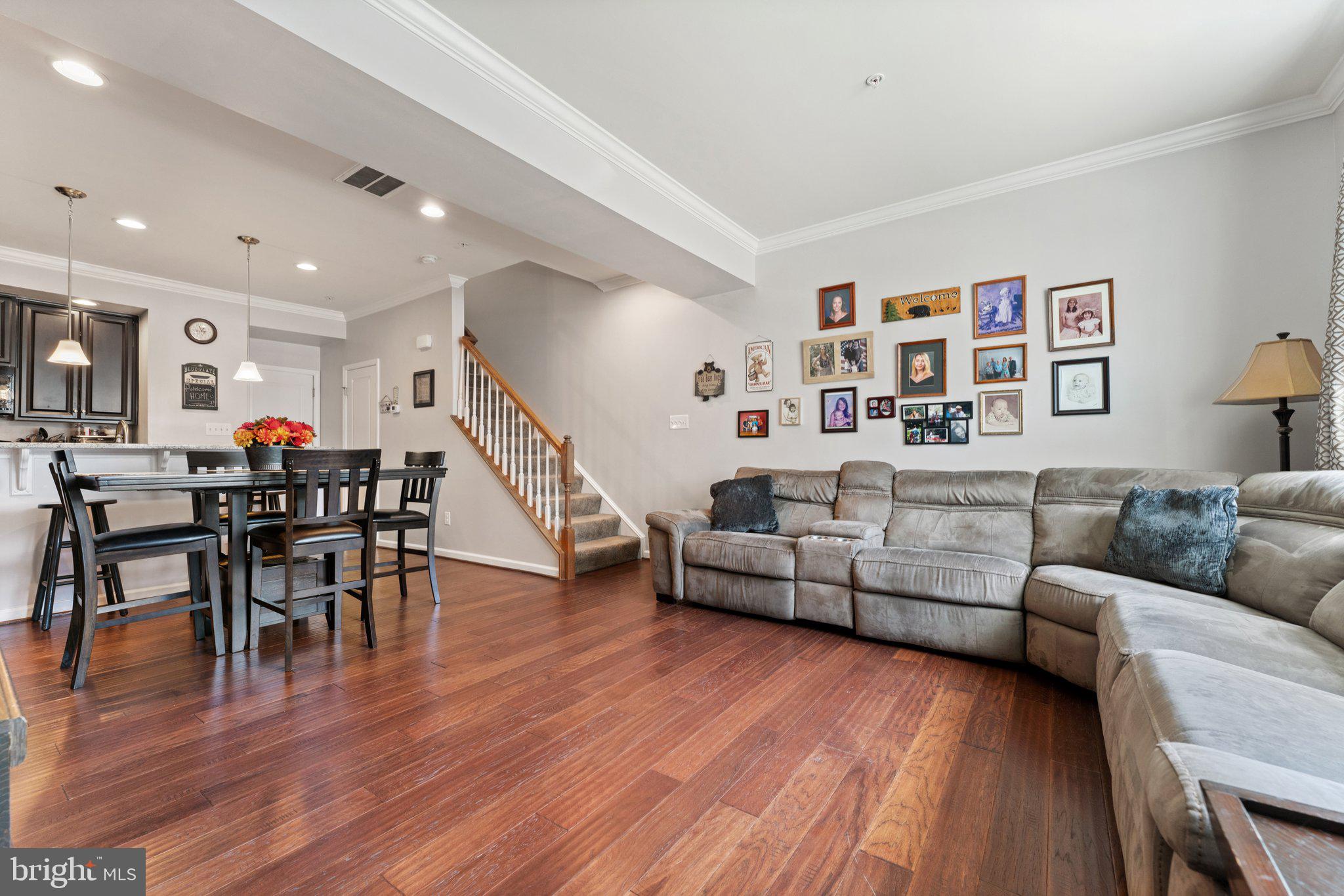 7494 Brunson Circle Gainesville, VA 20155 - Photo 22 of 49 a living room with furniture and wooden floor