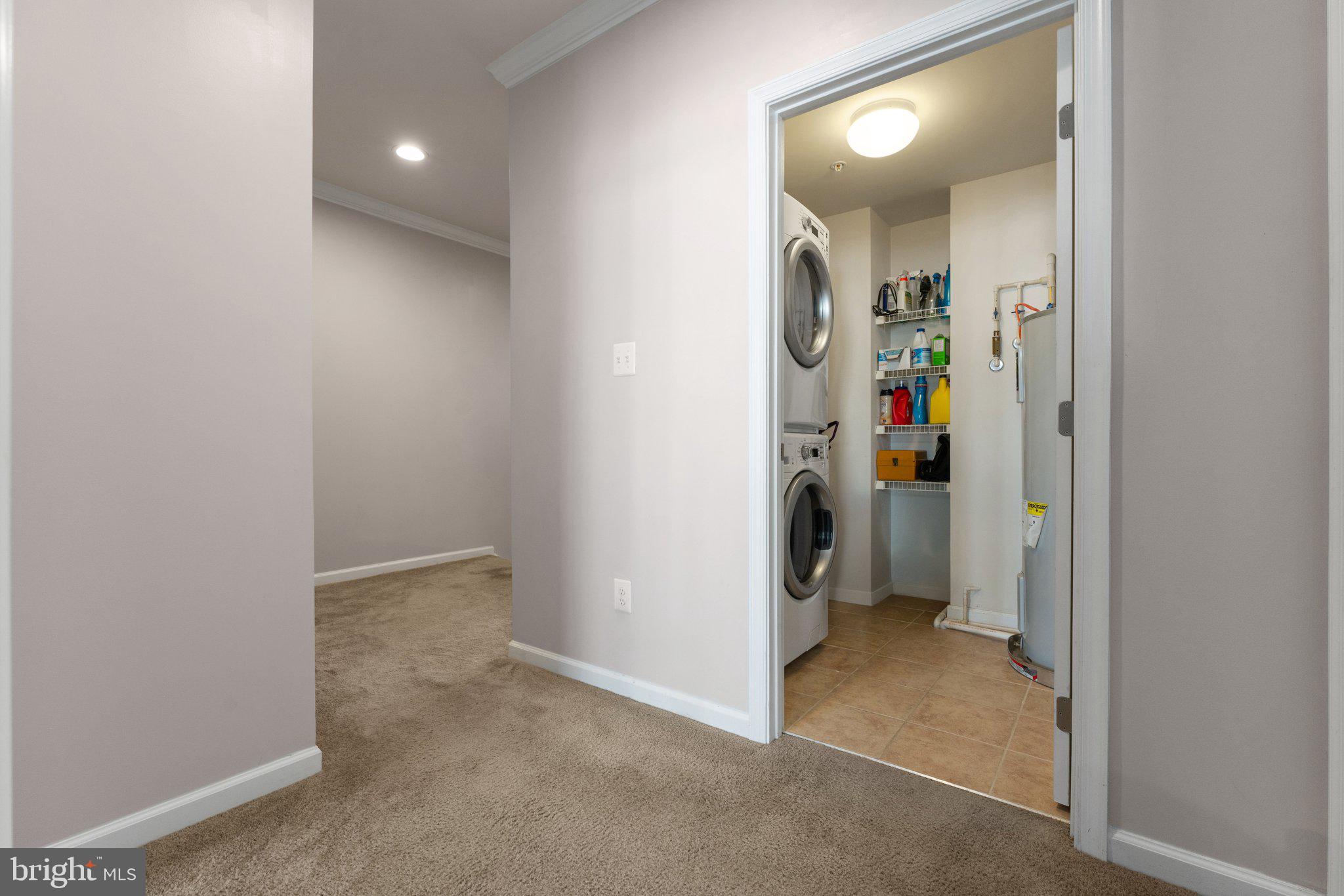 7494 Brunson Circle Gainesville, VA 20155 - Photo 28 of 49 an empty room and a bathroom with a sink