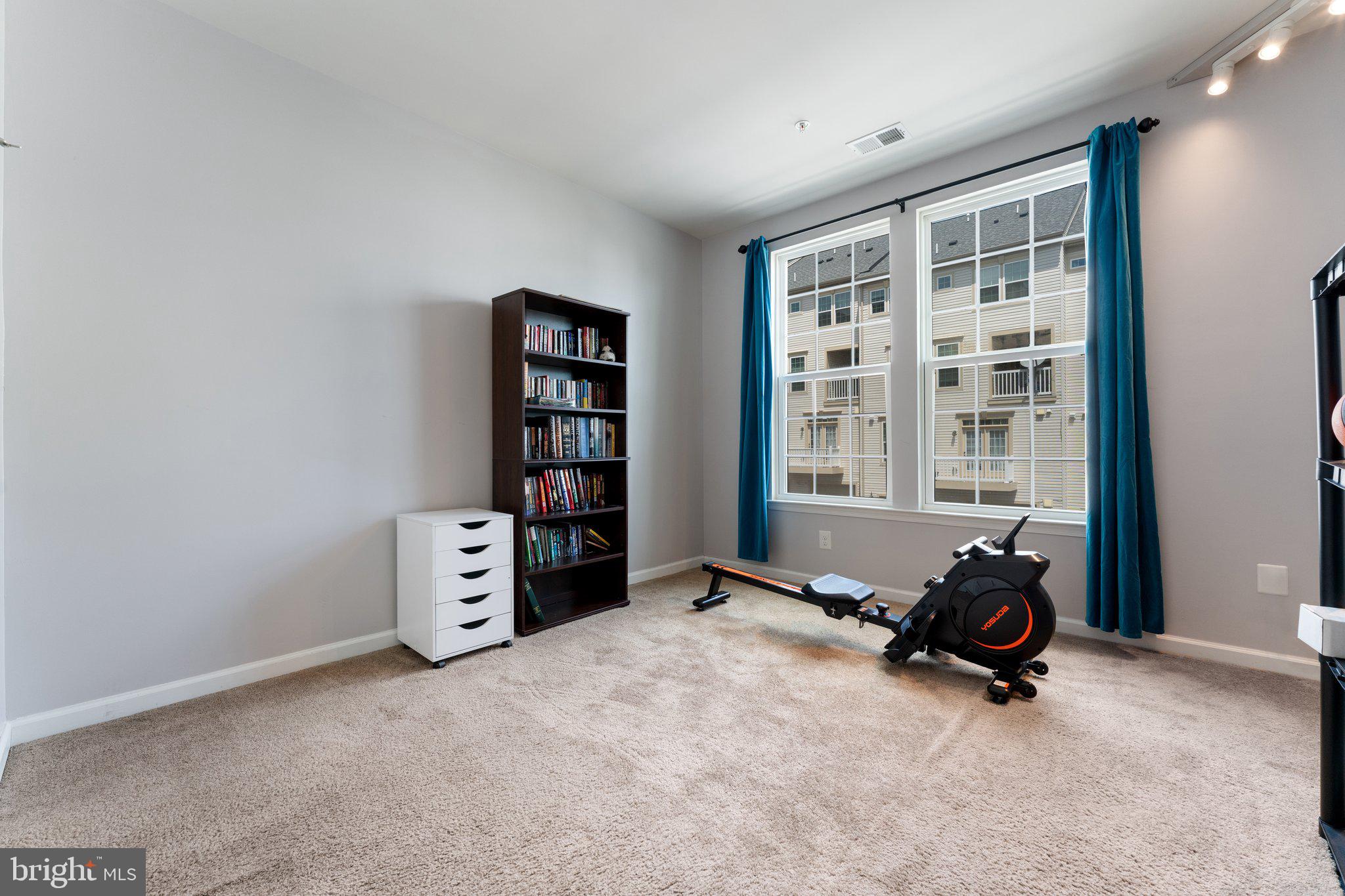 7494 Brunson Circle Gainesville, VA 20155 - Photo 30 of 49 a view of a livingroom with furniture and a large window