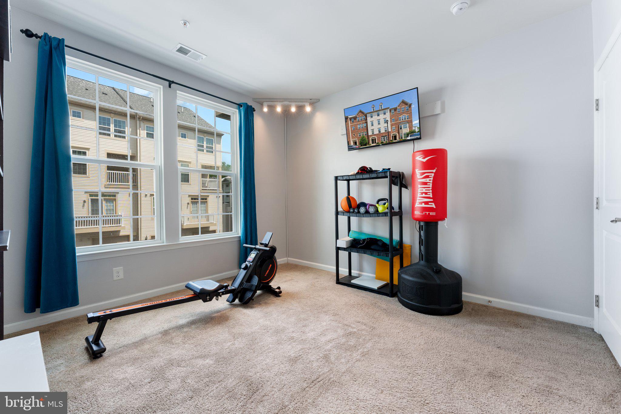 7494 Brunson Circle Gainesville, VA 20155 - Photo 31 of 49 a room with toys and a window