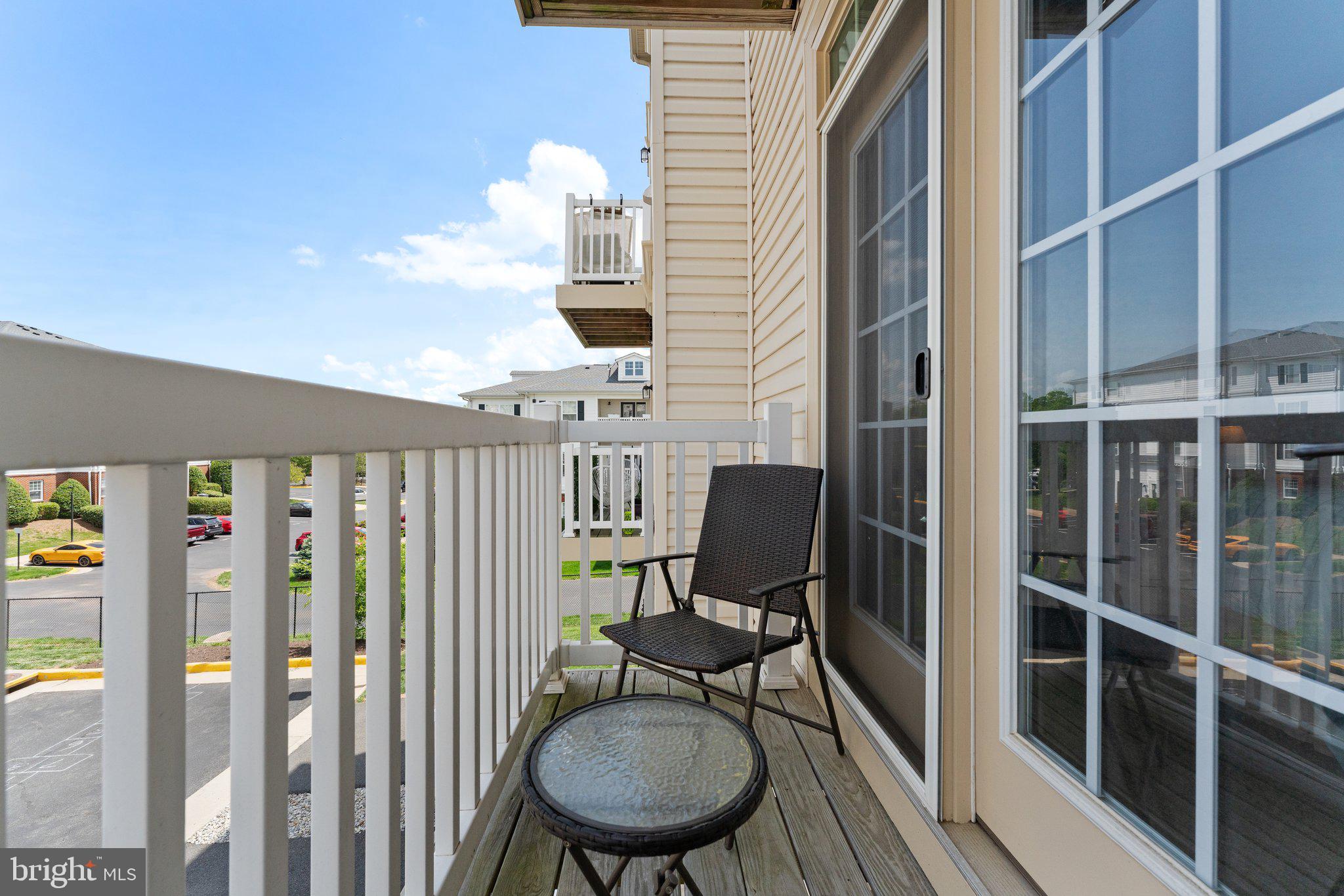 7494 Brunson Circle Gainesville, VA 20155 - Photo 37 of 49 a view of a room with furniture and wooden floor