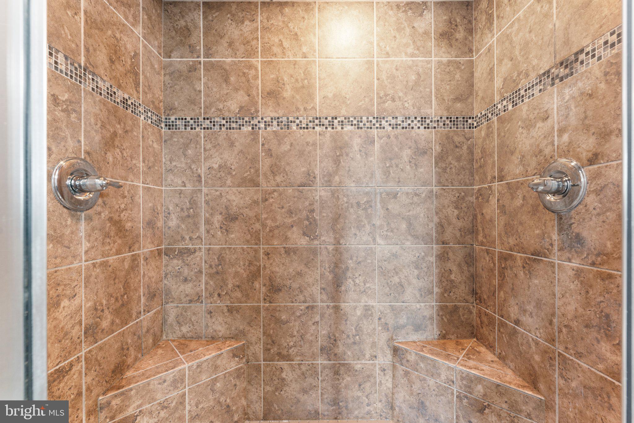 7494 Brunson Circle Gainesville, VA 20155 - Photo 47 of 49 a bathroom with a shower