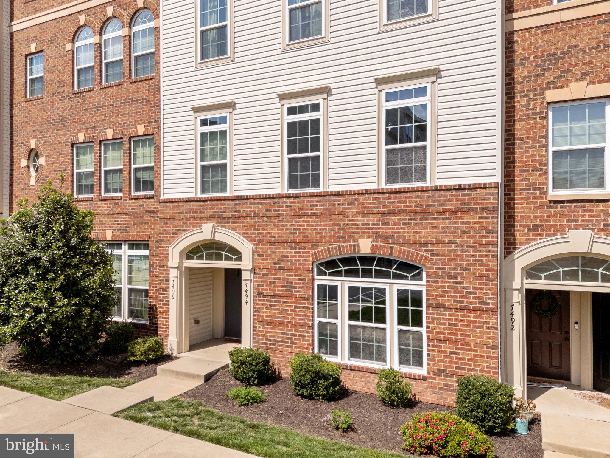 7494 Brunson Circle Gainesville, VA 20155 - Photo 6 of 49 a front view of a house