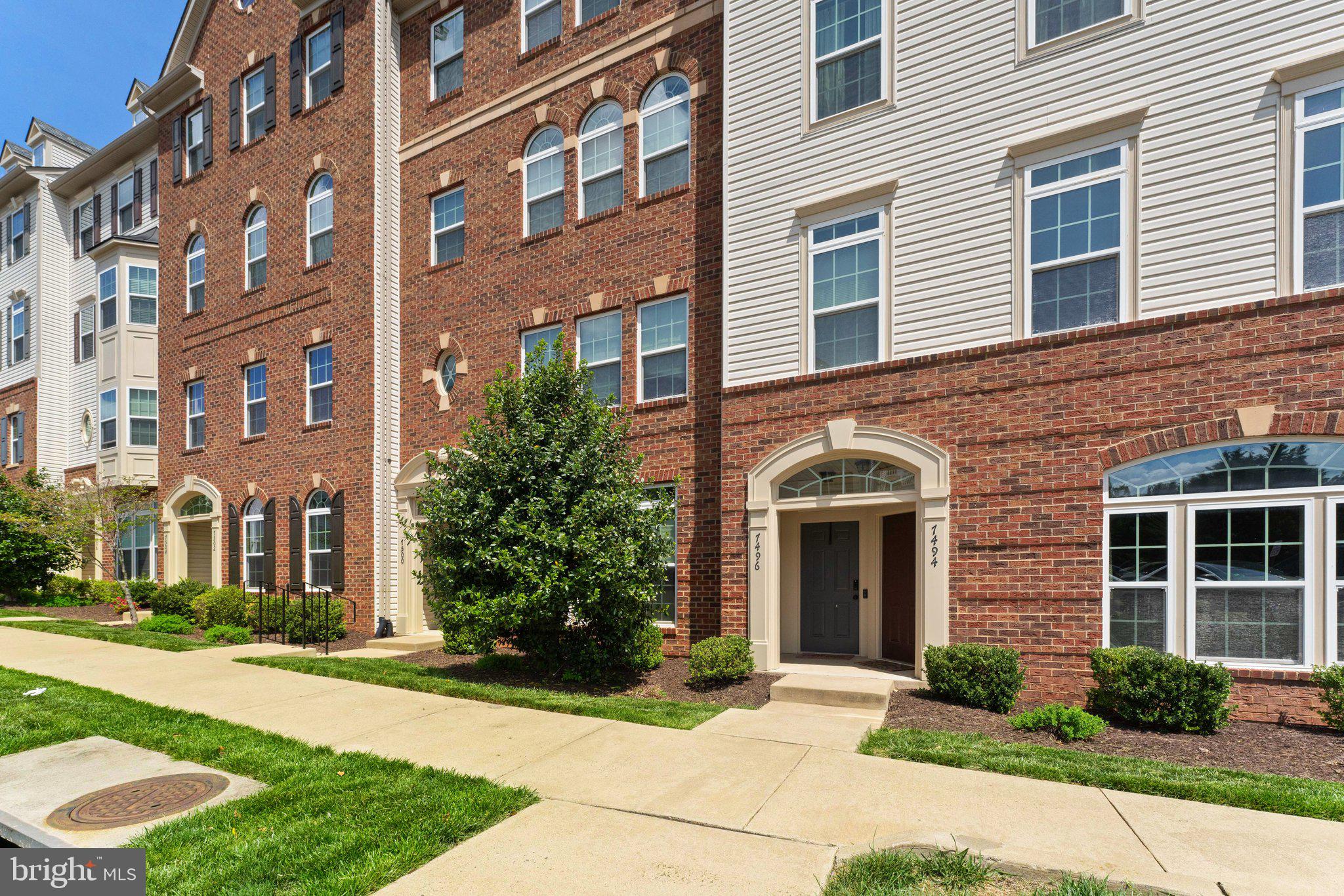7494 Brunson Circle Gainesville, VA 20155 - Photo 7 of 49 a front view of a building