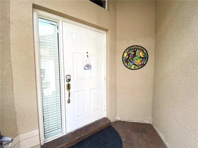a view of a small space with wooden floor