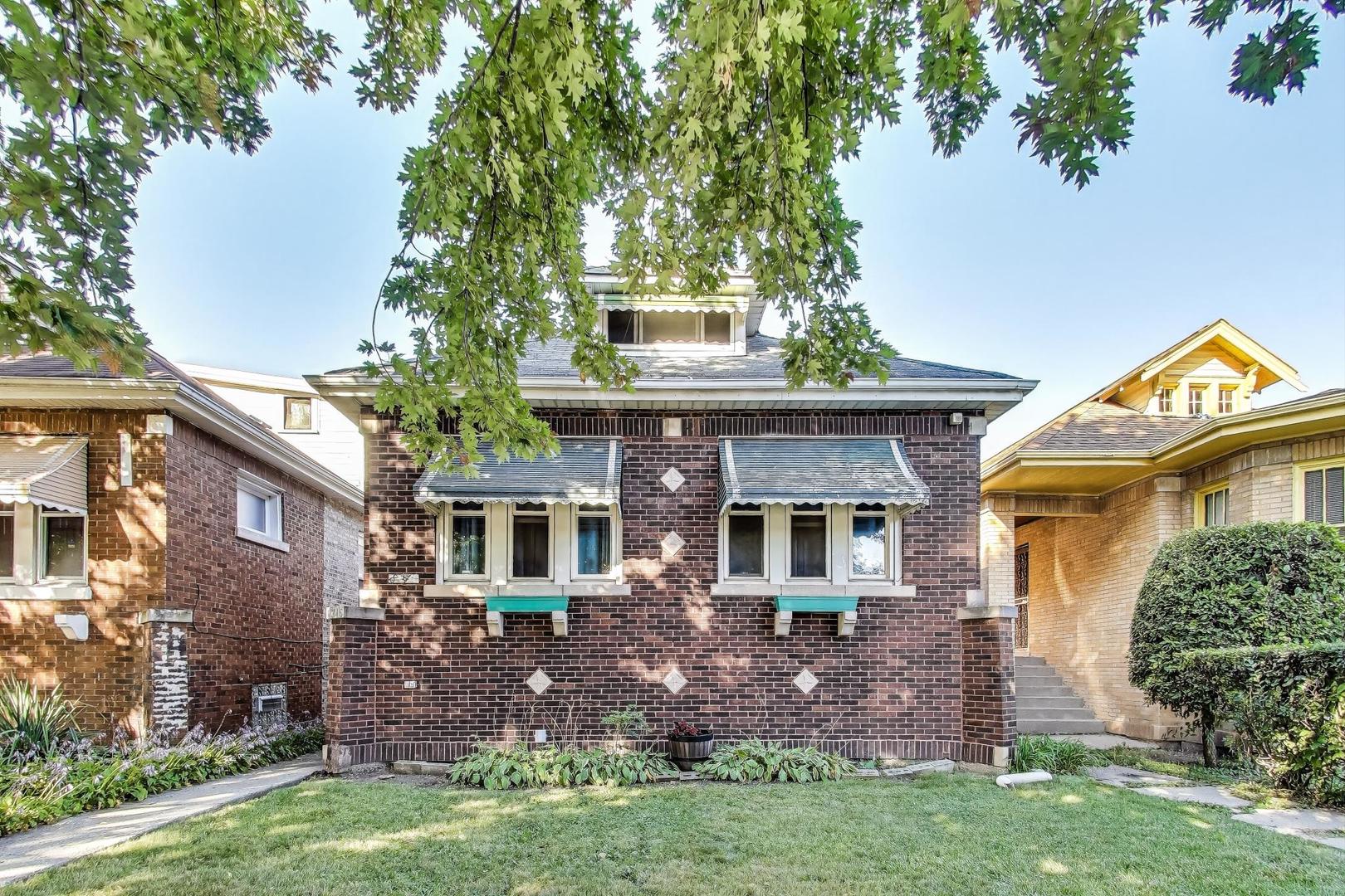 8346 South Aberdeen Street Chicago, IL 60620 - Photo 1 of 26 front view of house with a yard