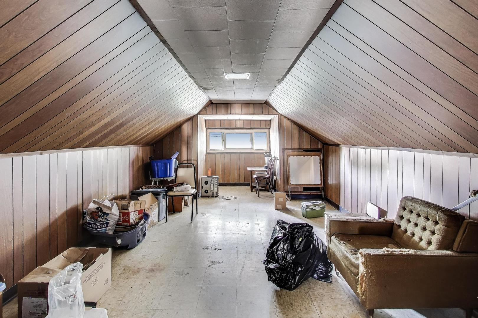 8346 South Aberdeen Street Chicago, IL 60620 - Photo 23 of 26 a living room with furniture and a large window