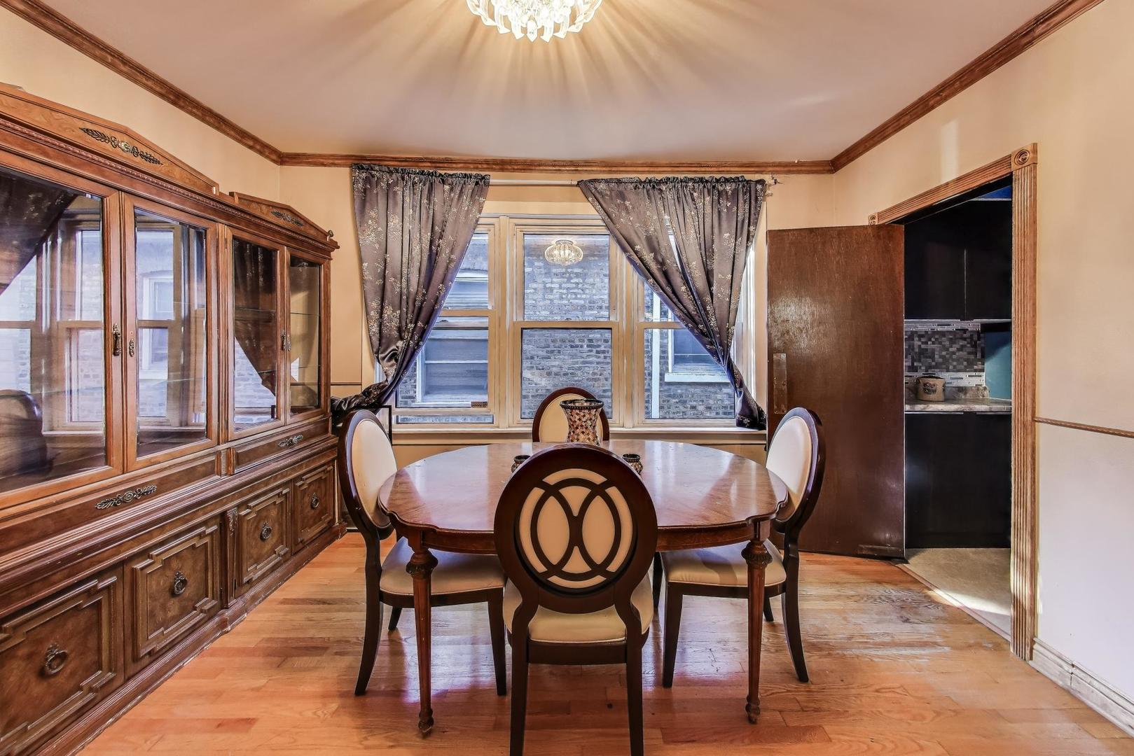 8346 South Aberdeen Street Chicago, IL 60620 - Photo 10 of 26 a view of a chairs in the balcony