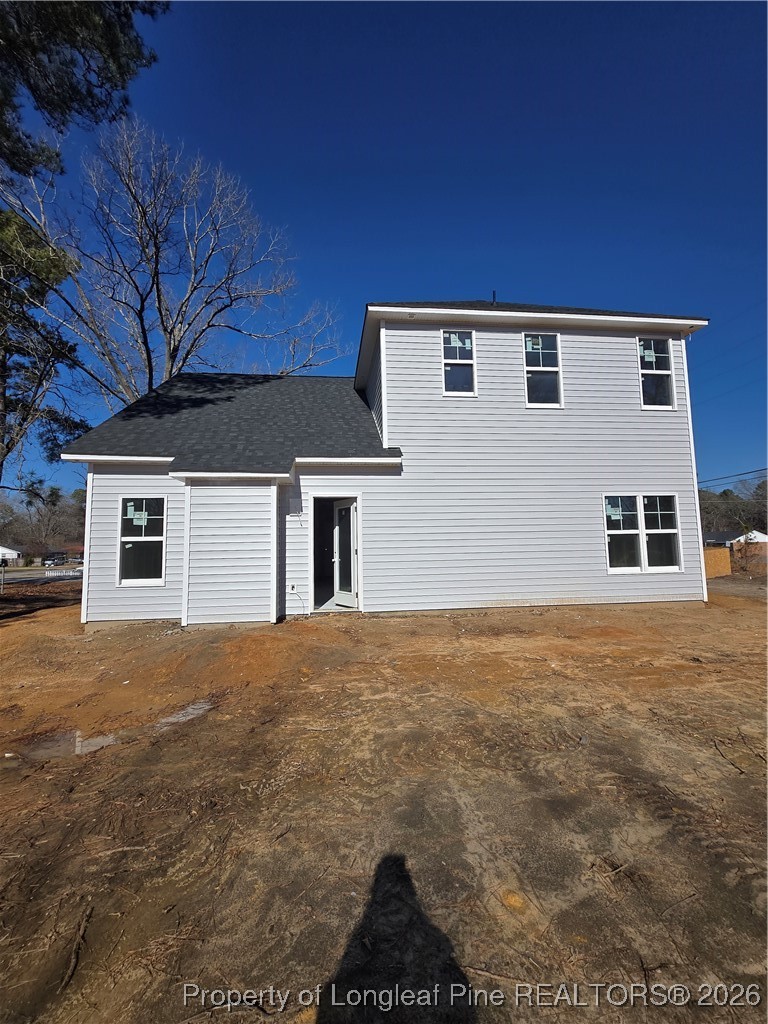 1354 East Manchester Road Spring Lake, NC 28390 - Photo 13 of 15 a front view of a house with a yard