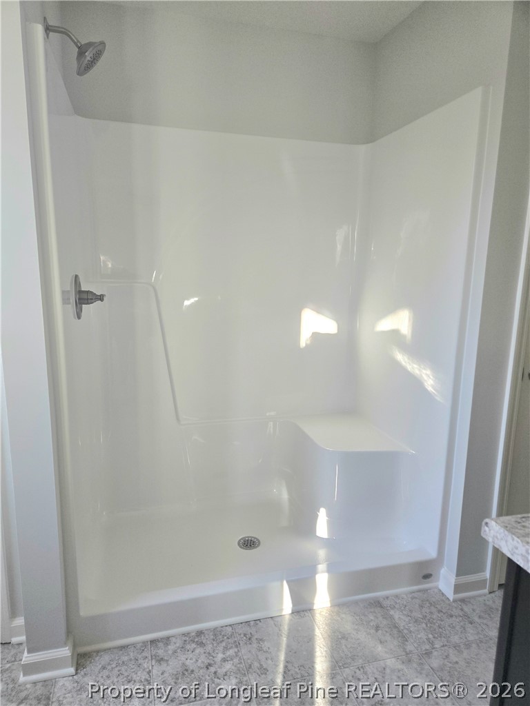 1354 East Manchester Road Spring Lake, NC 28390 - Photo 10 of 15 a bathroom with a shower