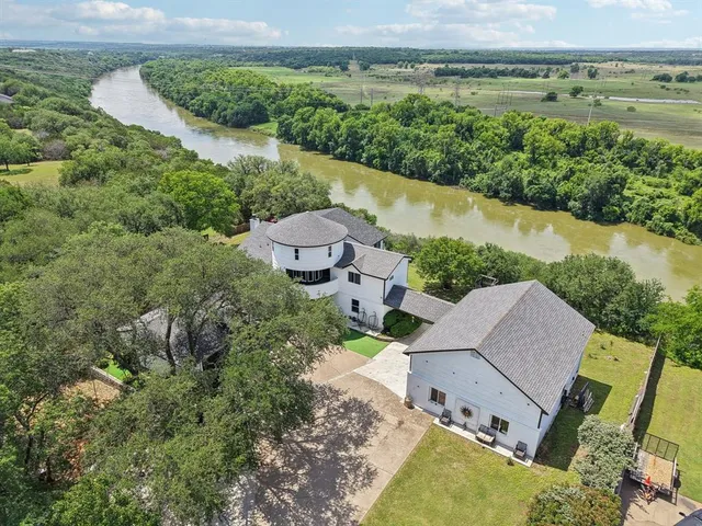 an aerial view of a house with garden space and outdoor space