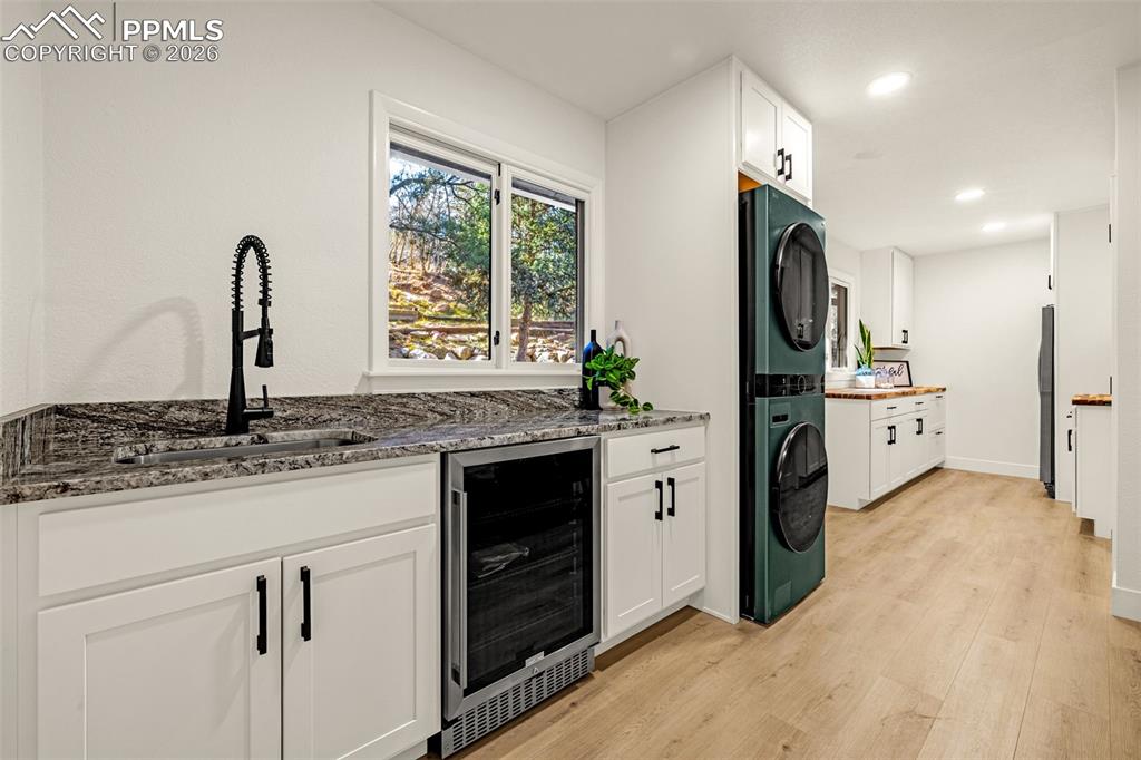 26 Leaming Road Colorado Springs, CO 80906 - Photo 16 of 45 a kitchen with stainless steel appliances granite countertop a refrigerator and a sink