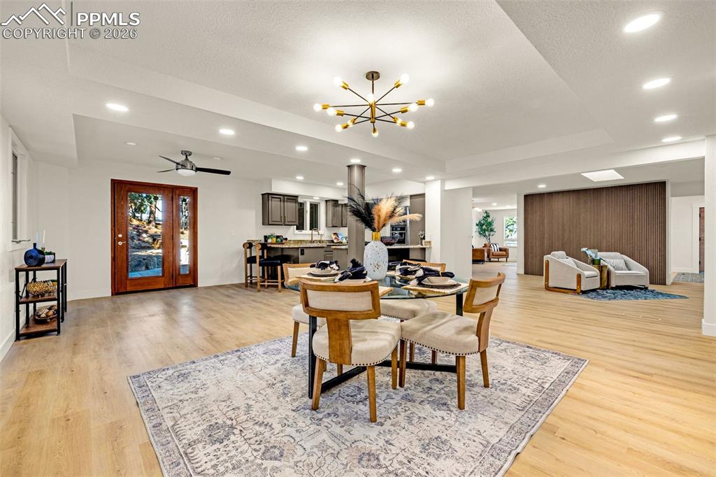 26 Leaming Road Colorado Springs, CO 80906 - Photo 20 of 45 a living room with furniture and a wooden floor