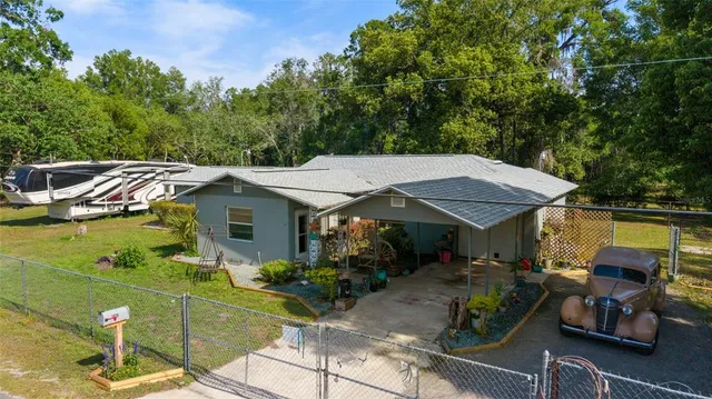 a view of a garden with patio