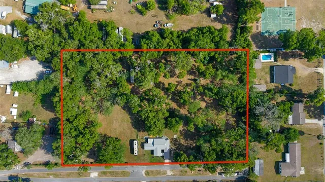 a living room with lots of furniture and a flat screen tv