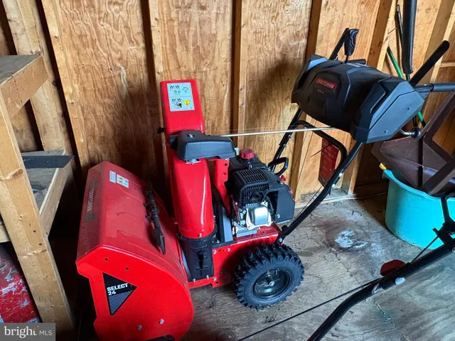 a room with lots of different colored cloths