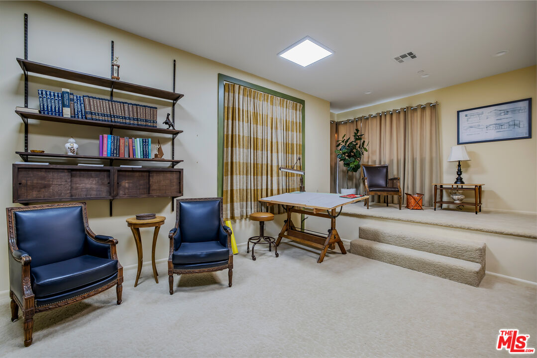 11222 Dilling Street Studio City, CA 91602 - Photo 16 of 30 a living room with furniture
