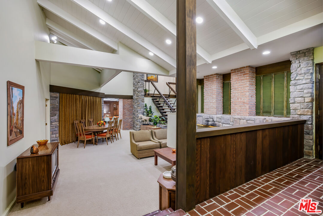 11222 Dilling Street Studio City, CA 91602 - Photo 2 of 30 a view of living room filled with furniture and window
