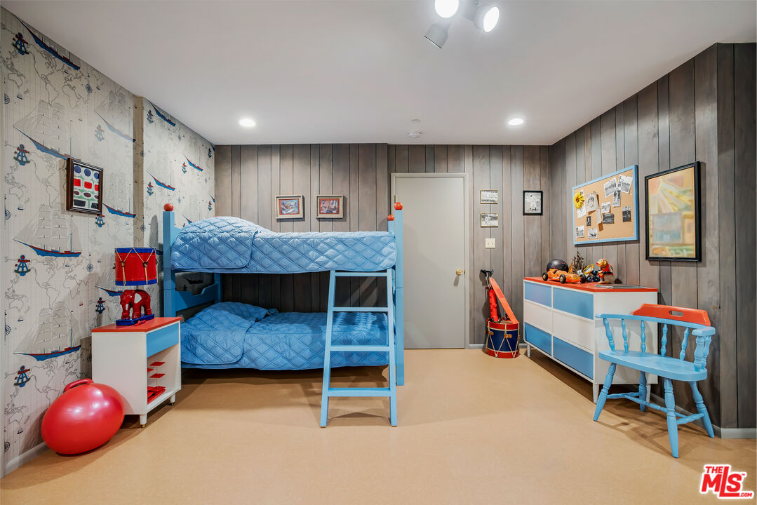 11222 Dilling Street Studio City, CA 91602 - Photo 21 of 30 a bedroom with furniture and a large window