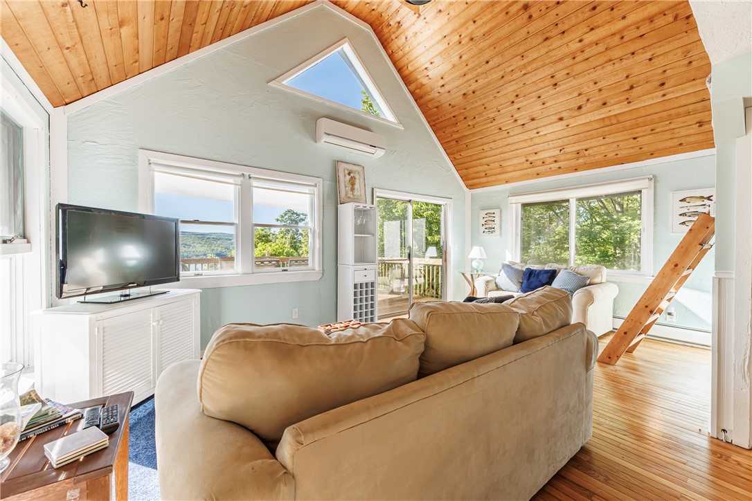 198 East Lake Road Middlesex, NY 14544 - Photo 10 of 50 SPECTACULAR CATHERDRAL CEILING LIVING ROOM WITH LA