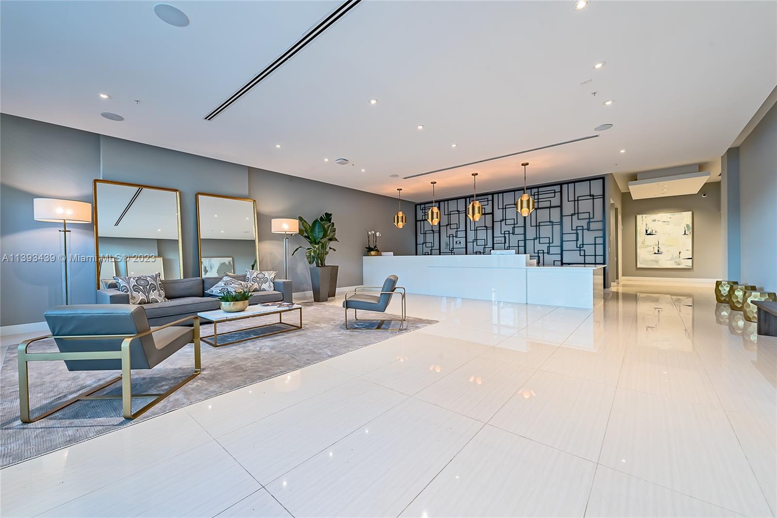 Edgewater Miami, FL 33137 - Photo 3 of 10 a living room with furniture and a table