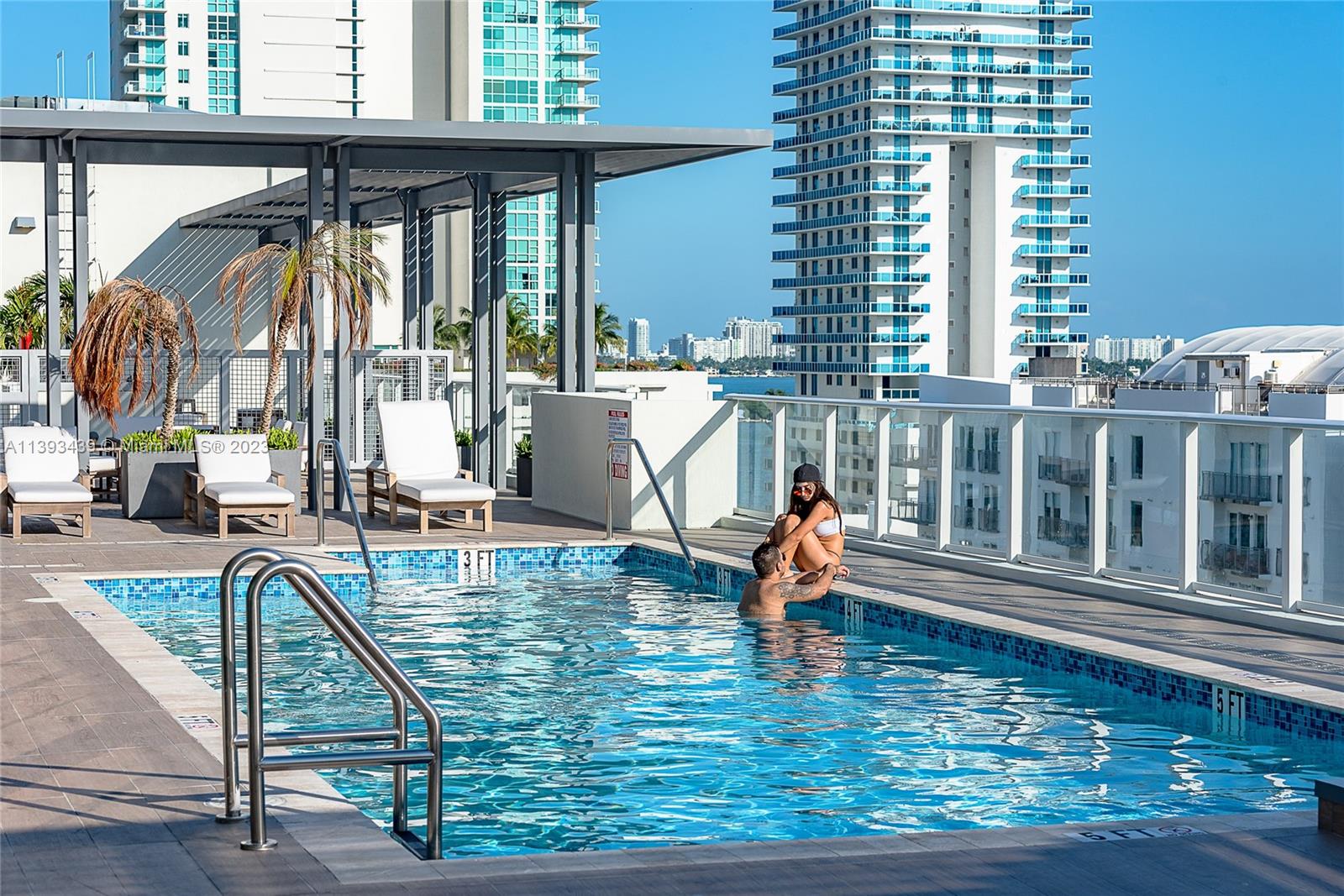 Edgewater Miami, FL 33137 - Photo 10 of 10 a living room filled with furniture
