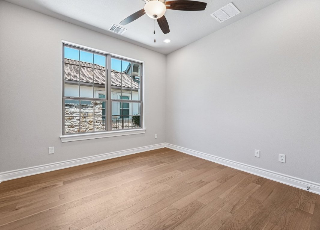 205 Indigo Lane Georgetown, TX 78628 - Photo 17 of 33 a view of an empty room with a window
