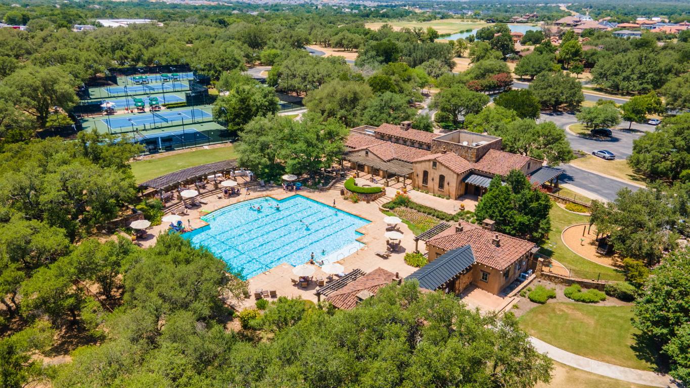 205 Indigo Lane Georgetown, TX 78628 - Photo 27 of 33 an aerial view of residential house with outdoor space and trees all around