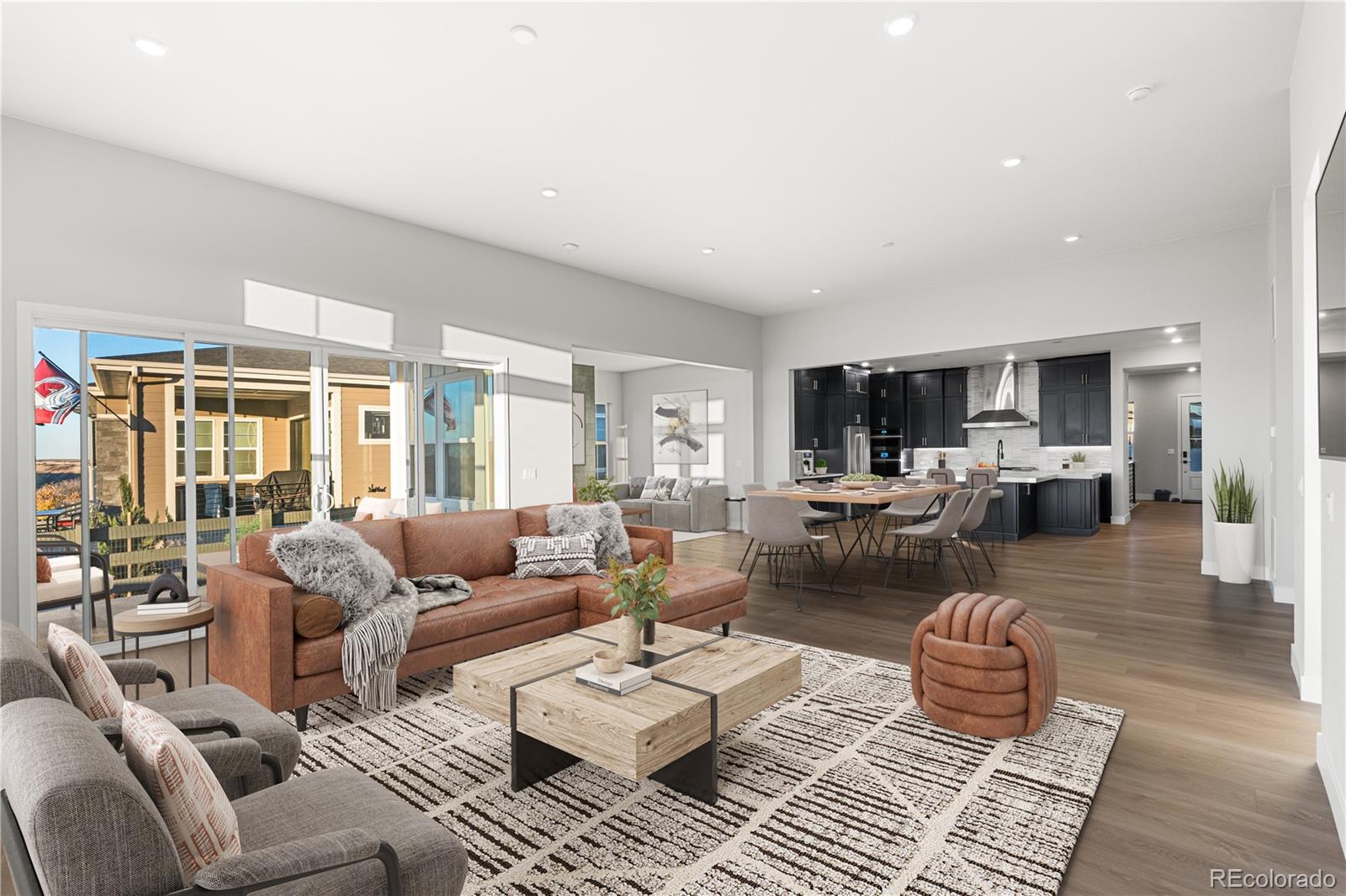 7317 Timberstone Street Castle Pines, CO 80108 - Photo 13 of 49 a living room with furniture and a large window