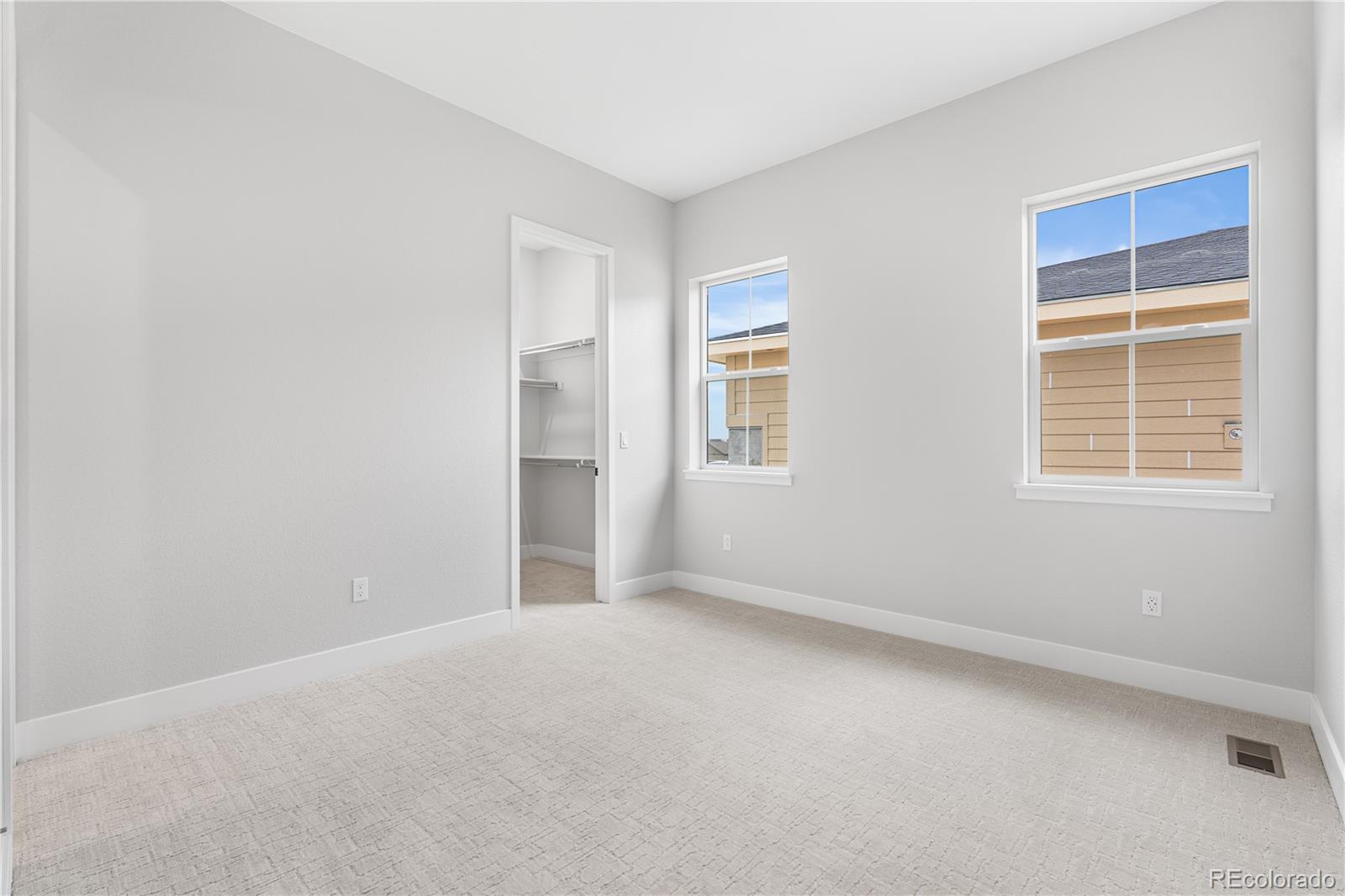 7317 Timberstone Street Castle Pines, CO 80108 - Photo 22 of 49 a view of an empty room with a window